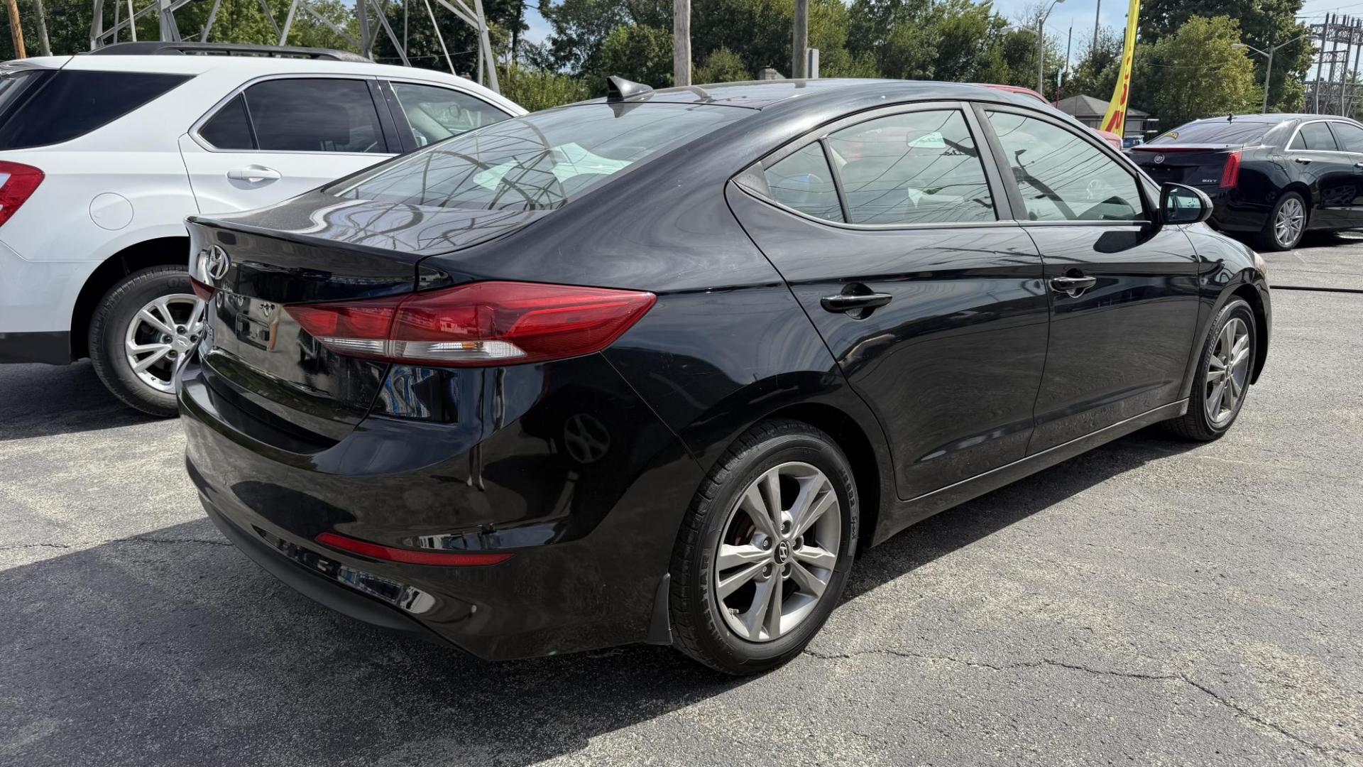 2017 BLACK Hyundai Elantra Limited (KMHD84LF8HU) with an 1.8L L4 DOHC 16V engine, 6A transmission, located at 2710A Westlane Rd., Indianapolis, IN, 46268, (317) 291-2000, 39.885670, -86.208160 - Photo#3
