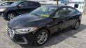 2017 BLACK Hyundai Elantra Limited (KMHD84LF8HU) with an 1.8L L4 DOHC 16V engine, 6A transmission, located at 2710A Westlane Rd., Indianapolis, IN, 46268, (317) 291-2000, 39.885670, -86.208160 - Photo#1