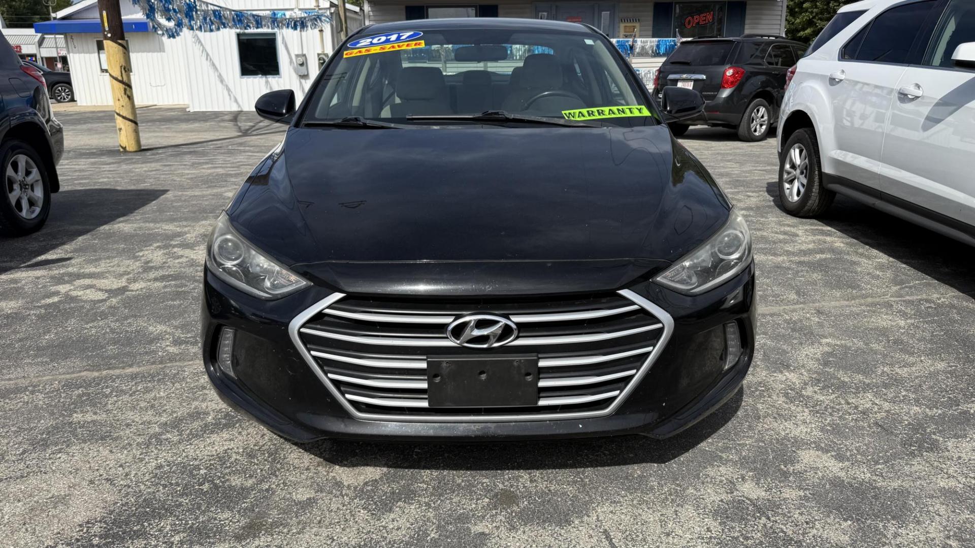 2017 BLACK Hyundai Elantra Limited (KMHD84LF8HU) with an 1.8L L4 DOHC 16V engine, 6A transmission, located at 2710A Westlane Rd., Indianapolis, IN, 46268, (317) 291-2000, 39.885670, -86.208160 - Photo#2
