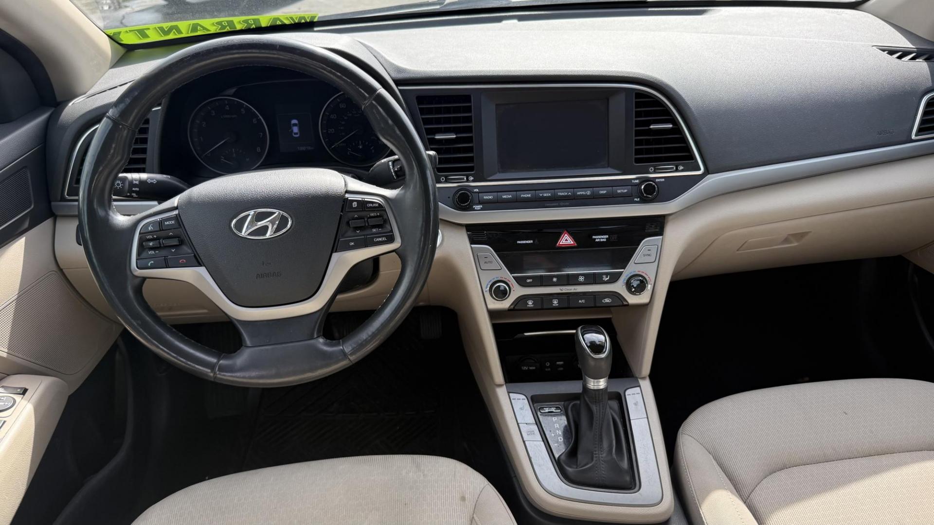 2017 BLACK Hyundai Elantra Limited (KMHD84LF8HU) with an 1.8L L4 DOHC 16V engine, 6A transmission, located at 2710A Westlane Rd., Indianapolis, IN, 46268, (317) 291-2000, 39.885670, -86.208160 - Photo#4
