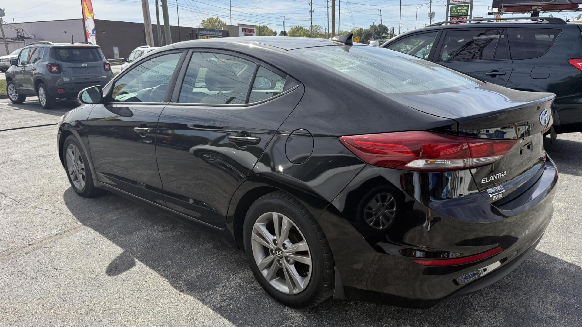 2017 BLACK Hyundai Elantra Limited (KMHD84LF8HU) with an 1.8L L4 DOHC 16V engine, 6A transmission, located at 2710A Westlane Rd., Indianapolis, IN, 46268, (317) 291-2000, 39.885670, -86.208160 - Photo#6