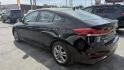 2017 BLACK Hyundai Elantra Limited (KMHD84LF8HU) with an 1.8L L4 DOHC 16V engine, 6A transmission, located at 2710A Westlane Rd., Indianapolis, IN, 46268, (317) 291-2000, 39.885670, -86.208160 - Photo#6